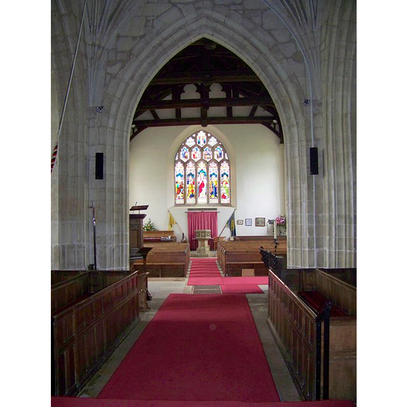 the font at the west end of the nave