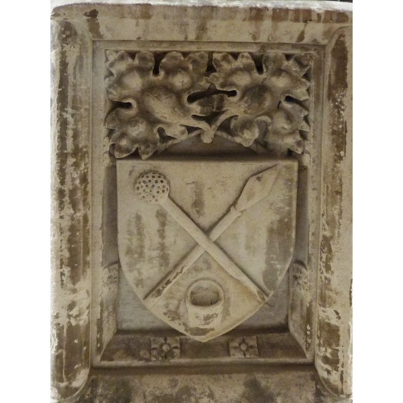 on the west side of the basin: a lance and sponge on a pole crossed
