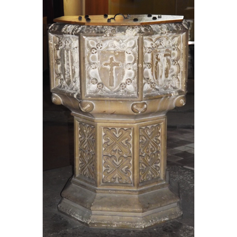 the modern font; sides showing Instruments of the Passion emblems: ladder -- cross -- pincers and hammer