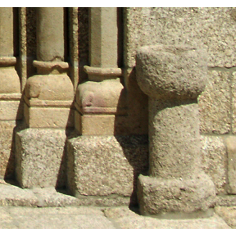 the stoup on the right side of the entranceway
