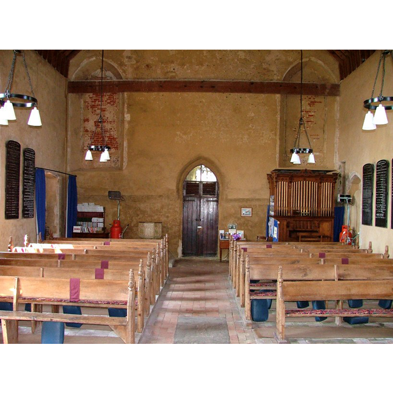 the top of the font is visible at the back (west) end, left (south) side, behind the banck of benches
