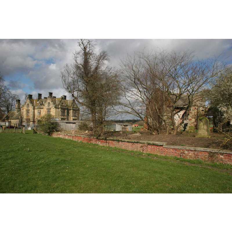 the newer manor house and the remains of the church