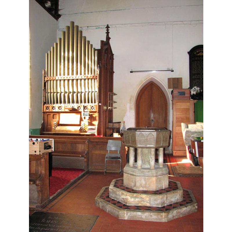 at the west end of the nave; behind, to the left, the organ; behind, door into the tower