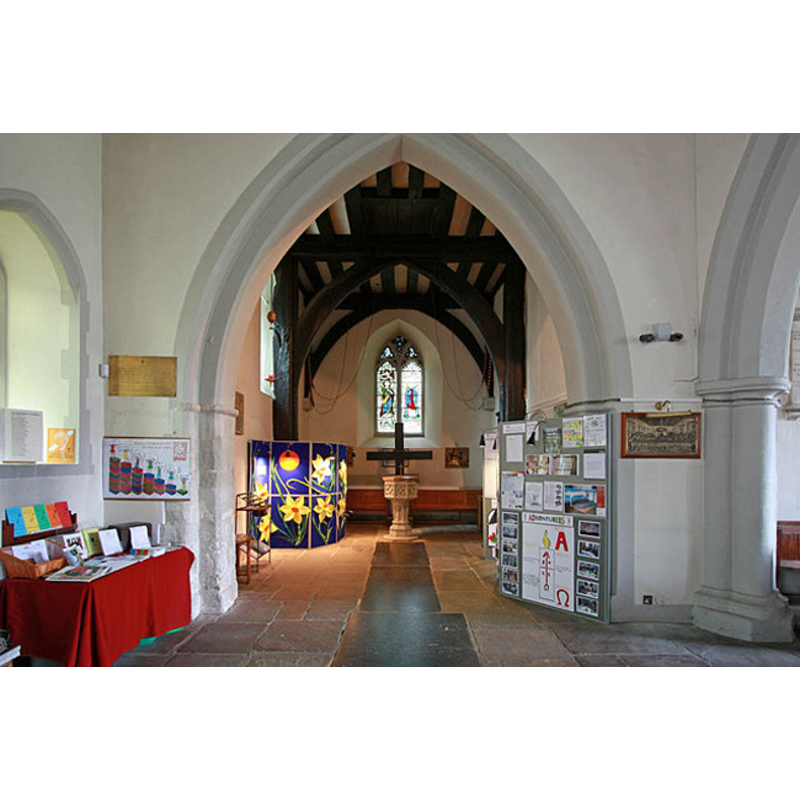 the 15th-century font at the west end