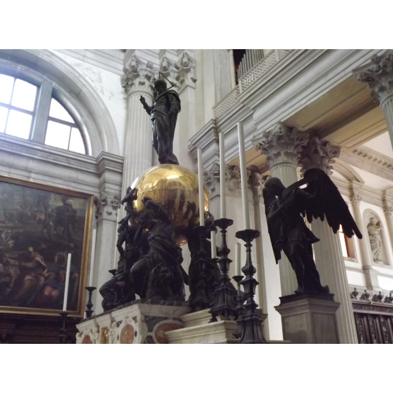branze by Antonio Vassilacchi representing the Four Evangelists holding up the orb with God the Father atop