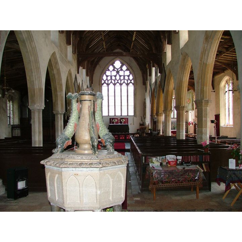 the font and cover at the west end of the nave