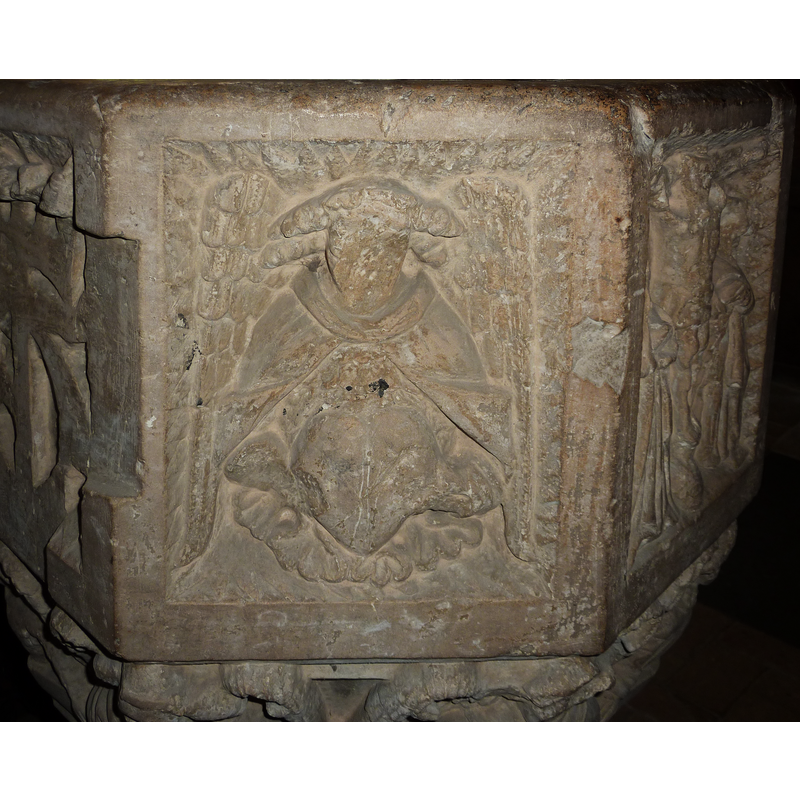 to the left of the Crucifixion, on the northwest side of the basin