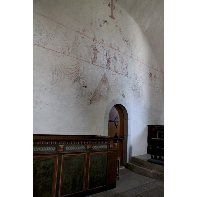 above the choir and sacristy door