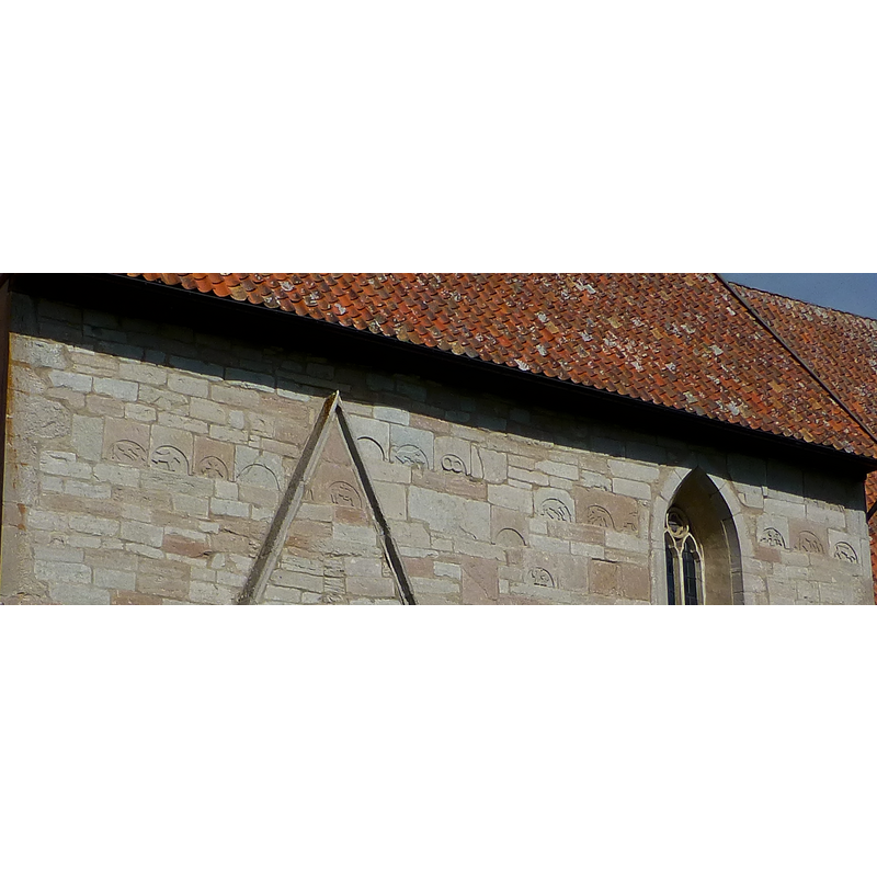 on the south wall, in the area corresponding to the nave