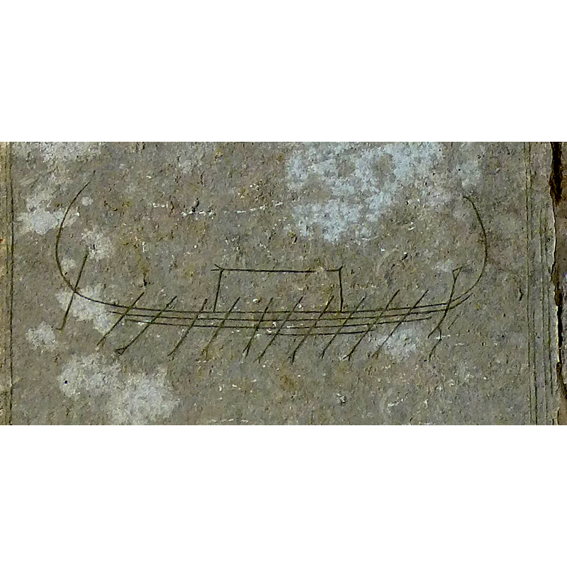an old stone re-set at the bottom of the tower, south side; inscribed Viking ship [NB: image rotated 90 degrees clockwise]