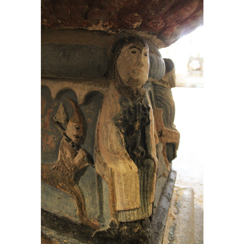 St.Peter sits enthroned, holding two keys in his right hand, full frontal, covered by a mantel.