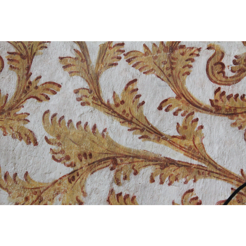 a fern-like pattern repeated on the walls of the chancel and nave