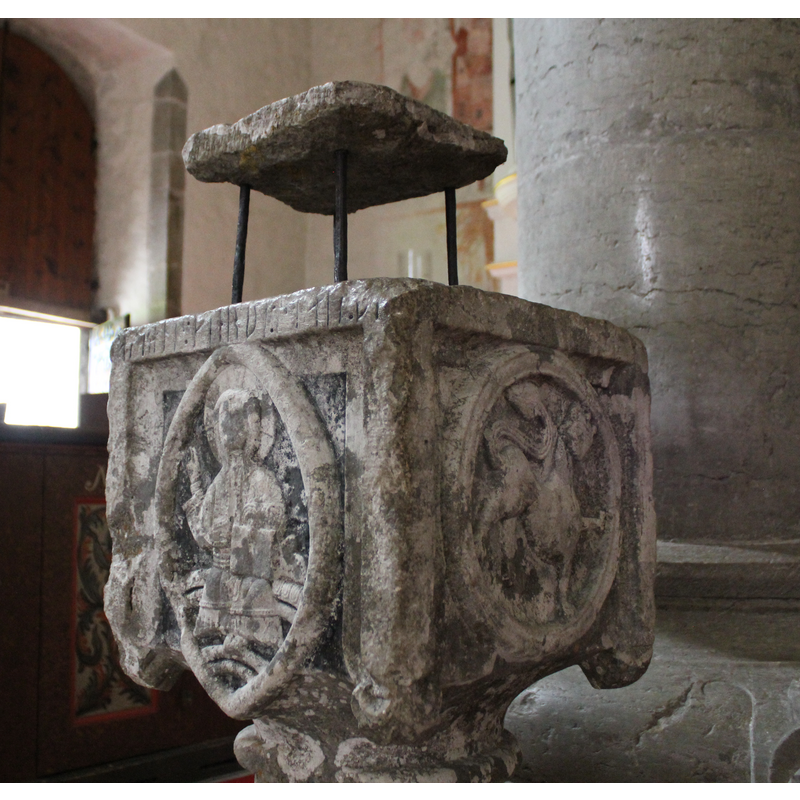 showing Christ in Majesty on the east side; crowned lion in a circle on the north side