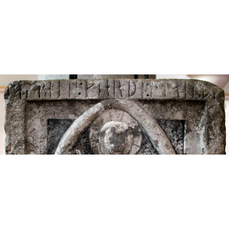 the Runic inscription on the upper frame -- transcribed and translated in Gunnar Svahnström: "Lafrans gjor denna sten = Lafrans made this stone" [source: pamphlet available inside the church in several languages].