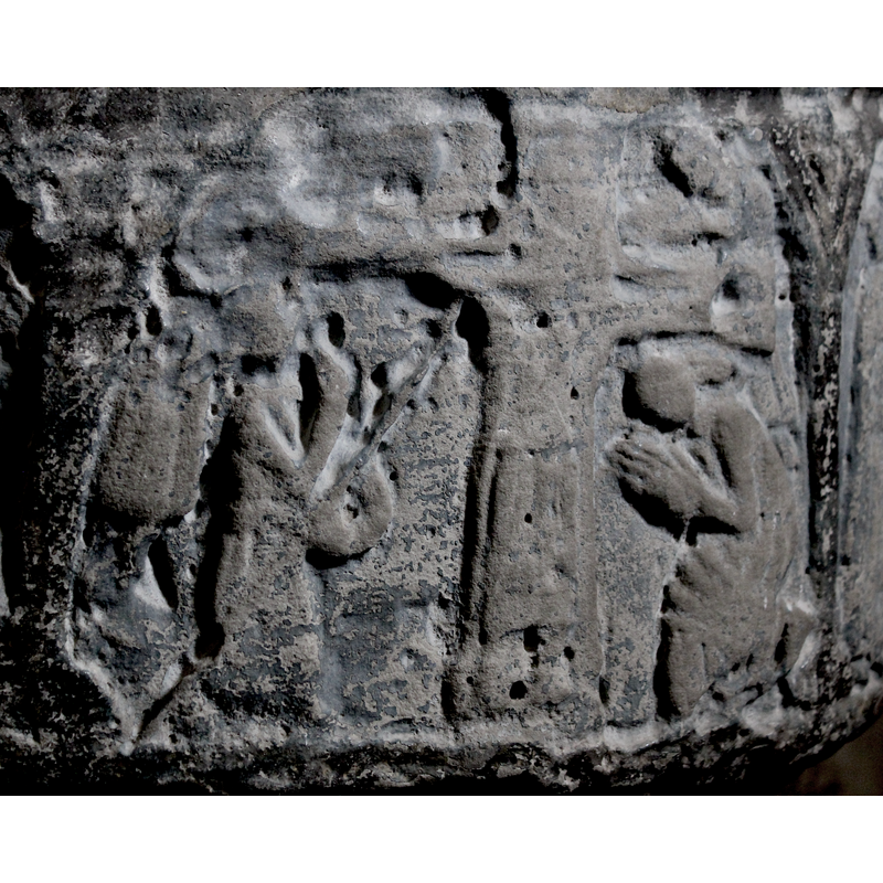 notice the two praying figures on the right, upper and lower corners