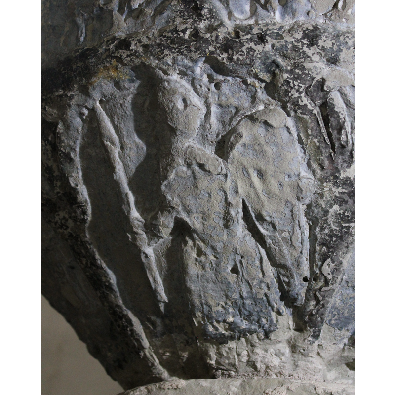 on the east side of the underbowl, beneath one of the Passion scenes
