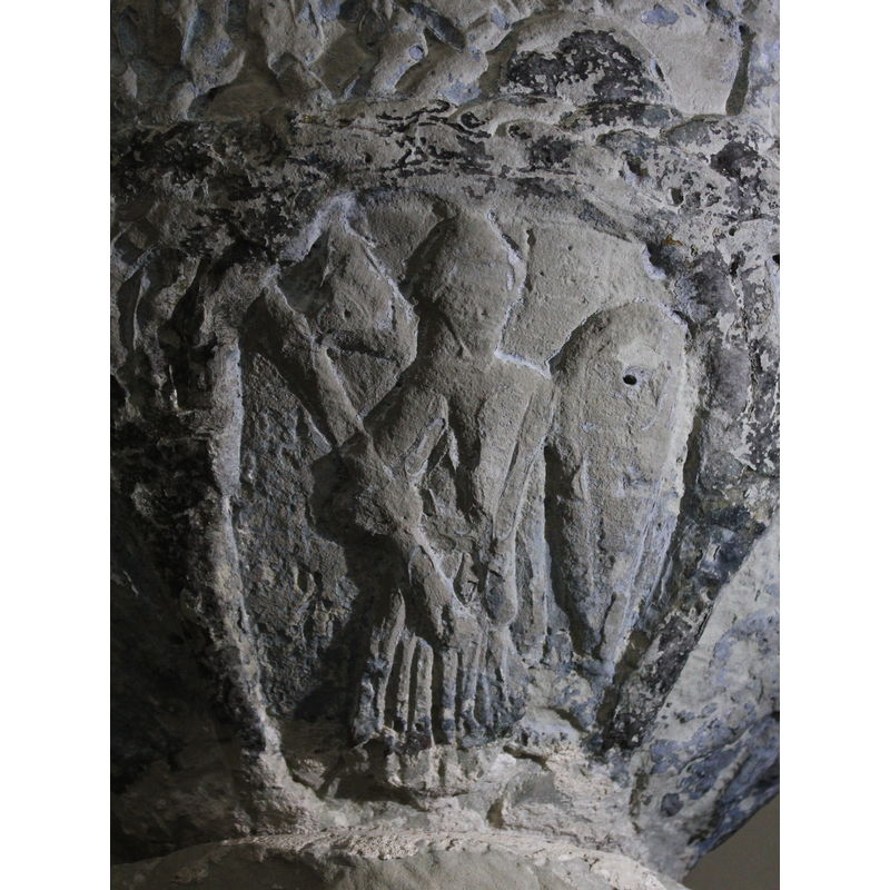 beneath one of the Passion scenes