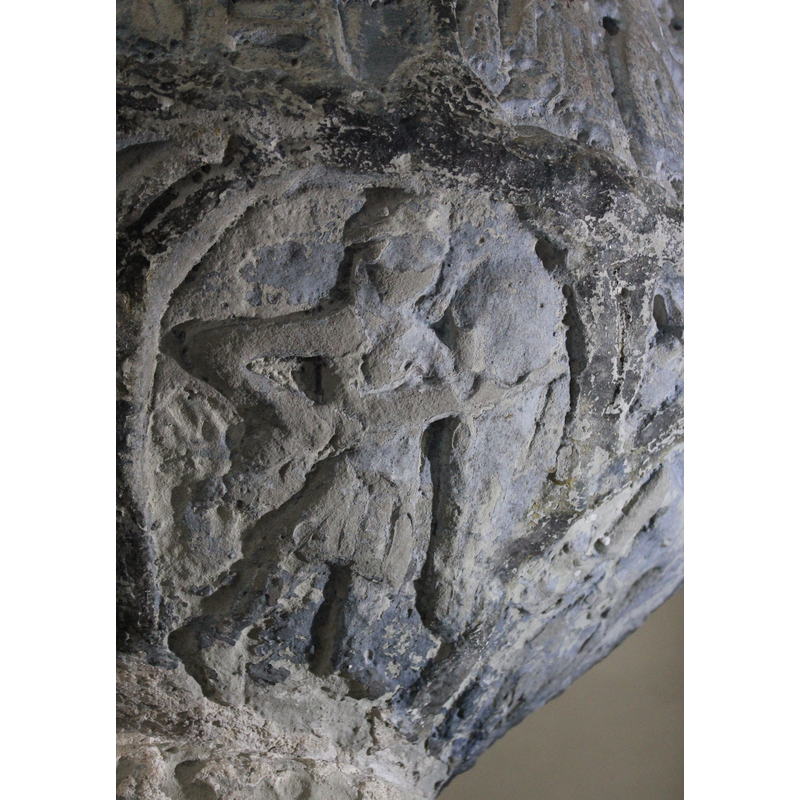 beneath one of the Passion scenes