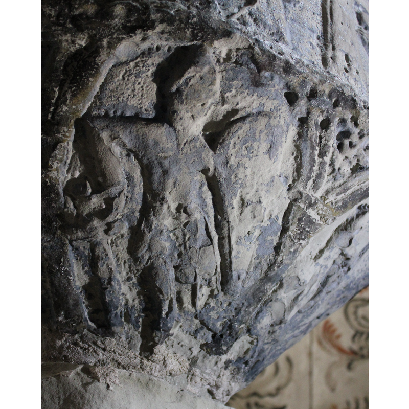 beneath one of the Passion scenes