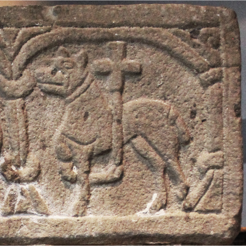 in the right arch of side 1; facing left; no halo