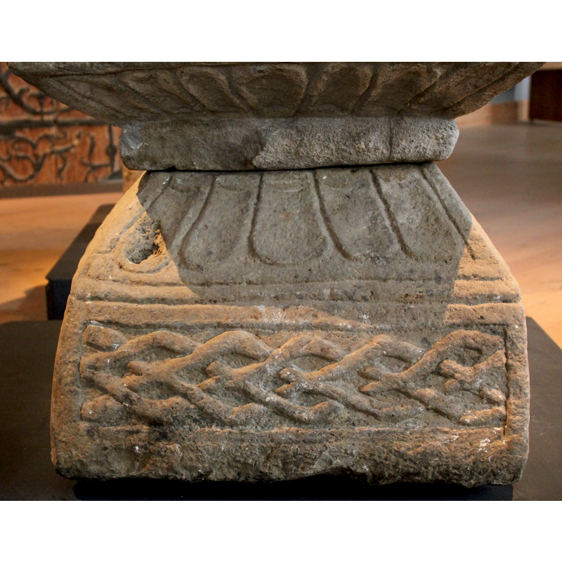 side 4, upper part of the base; similar to the pattern on the four sides of the underbowl