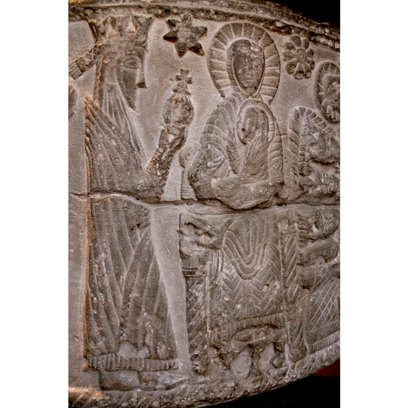 first Magus faces the Madonna and Child; star above