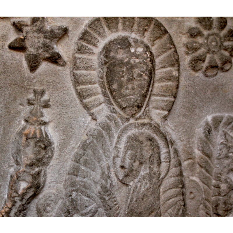 haloed Madonna and Child; the six-point star belongs to this scene; the rounded guiding star to the right belongs to the next scene, the dream of the Magi