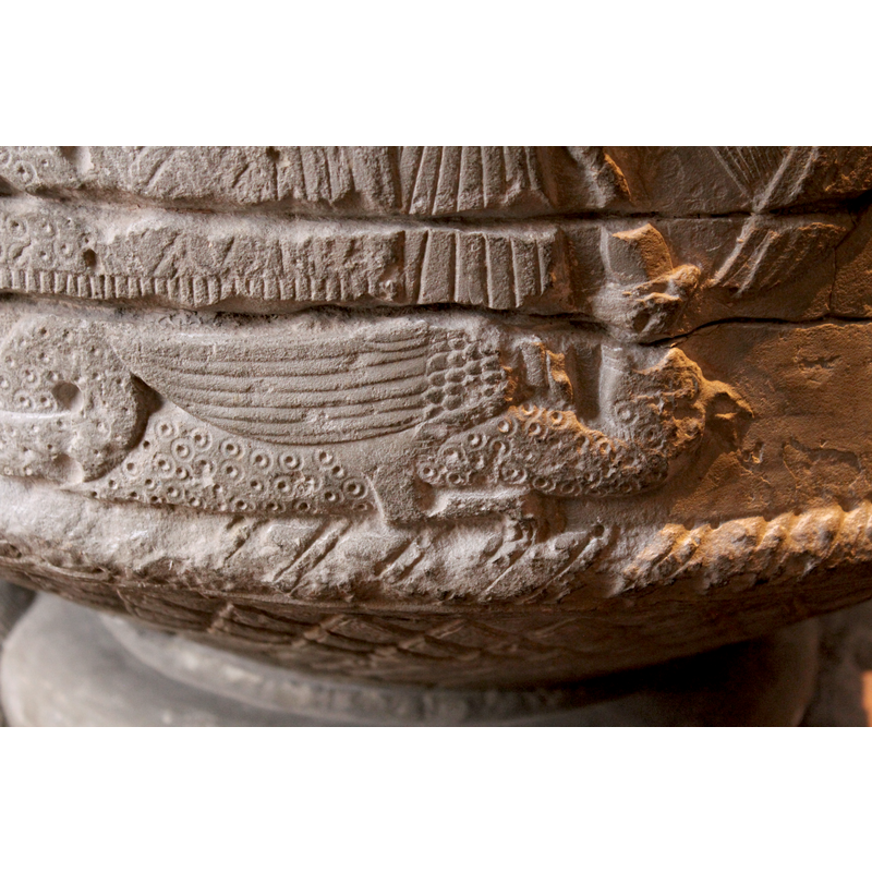 the dragon' body under the Magi's bed; the head sticks out and receives the blow from the Archangel's spear