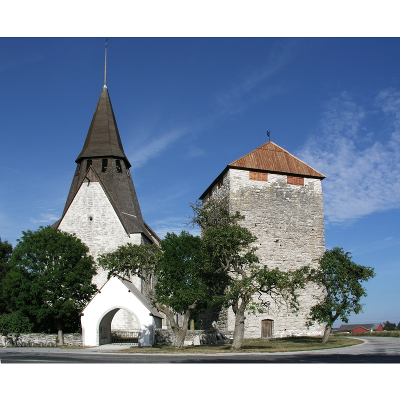 the view includes the fortified tower near the church