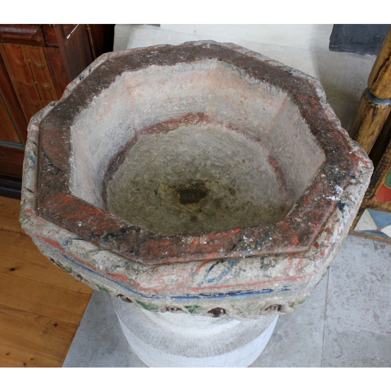 notice how crude and irregular the octagonal basin is; the drain hole is plugged now