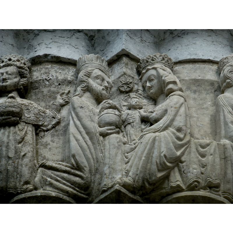 a Magus kneels before Madonna and Child, part of the Adoration of the Magi scene