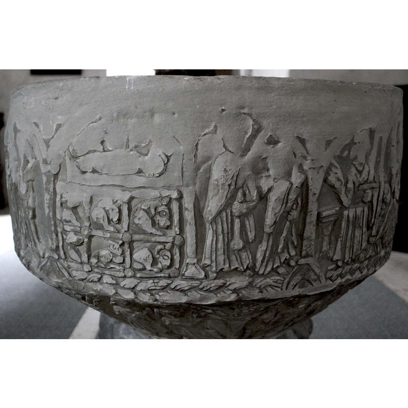 This scene depicts the Child on the manger above the penned animals in the stable. There is no Madonna or Joseph present.