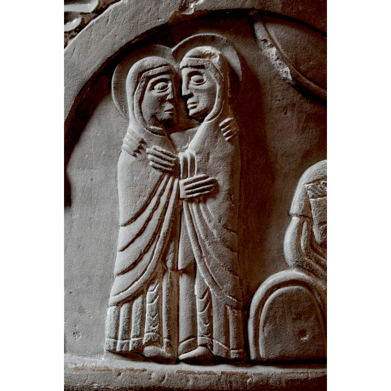 Two haloed women embracing. Cloud in upper right corner. This same arcade contains the next scene, the Dream of Joseph