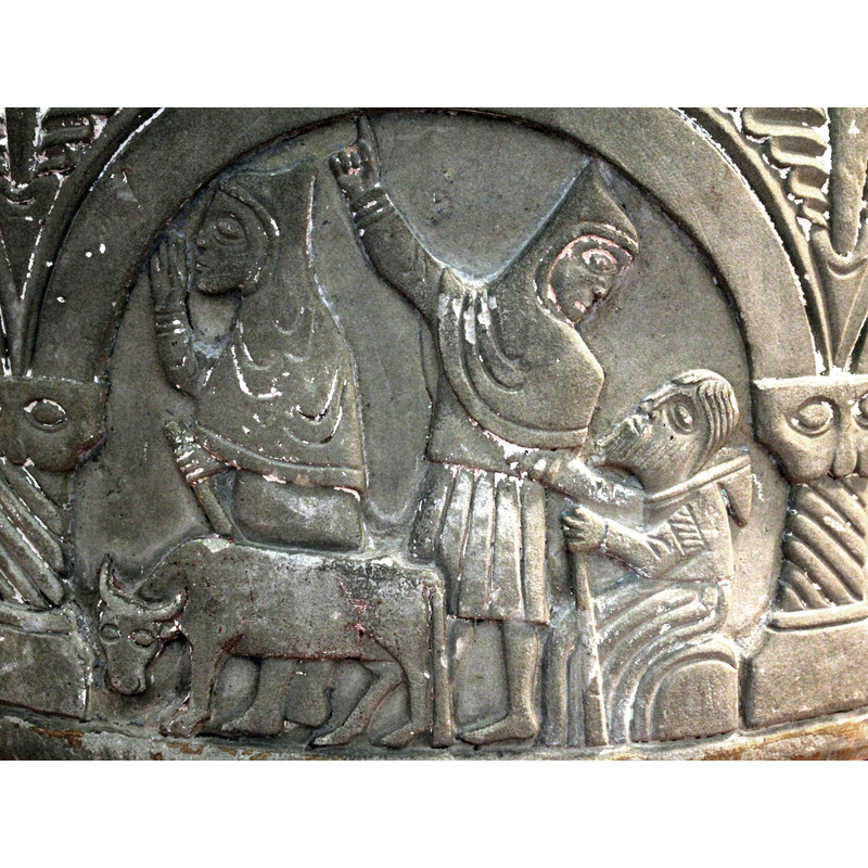 A calf stands to the left in the foreground; behind it a shepherd with staff holds his right hand to his mouth or face. A second shepherd stands in the centre, resting his left hand on a seated old man with a canel the second shepherd points up to the sky with his right hand. The old man seated on a rock  looks upwards.The three shepherds wear hooded tunics; the two younger shepherds have their hoods on; the hood is off old seated man's head