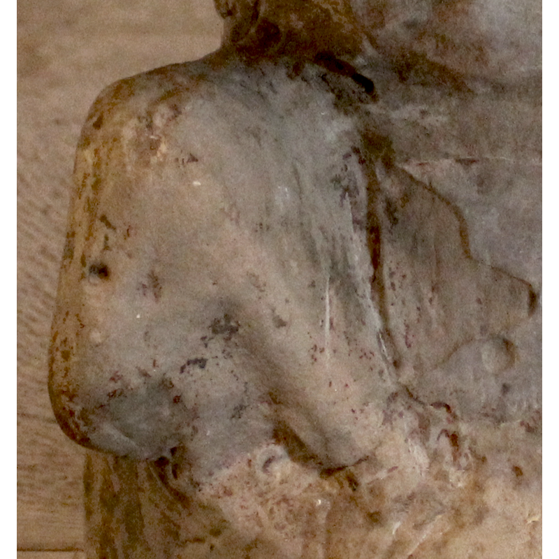 on the southwest angle of the base; right-side view -- tentative identification