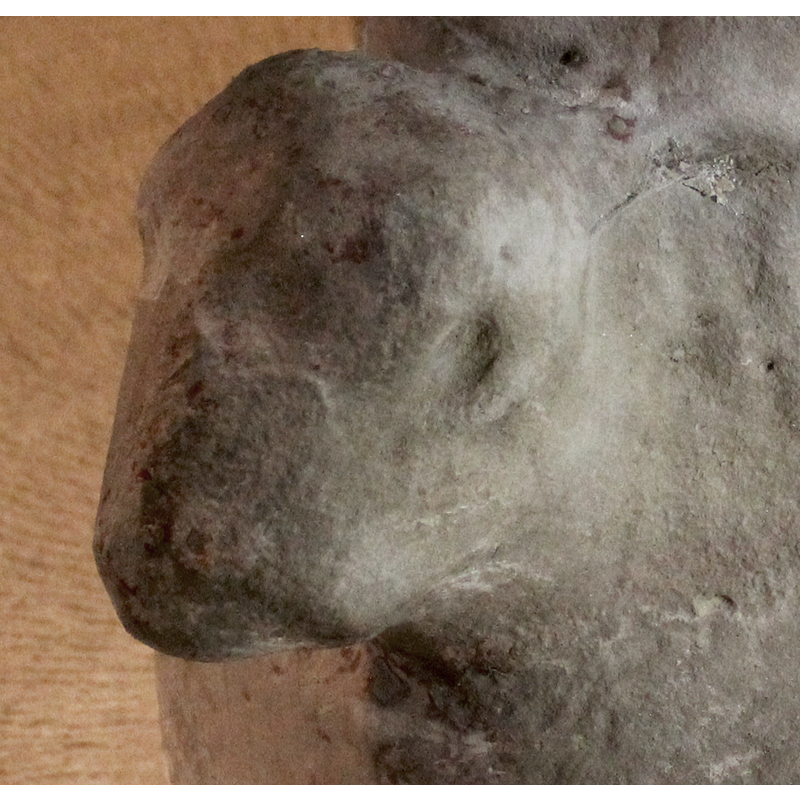 on the southeast angle of the base; right-side view -- tentative identification