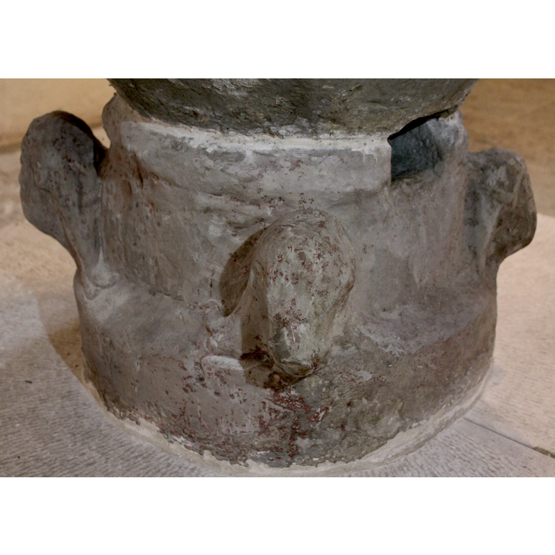 the human head on the left; centre and right appears to be lion heads