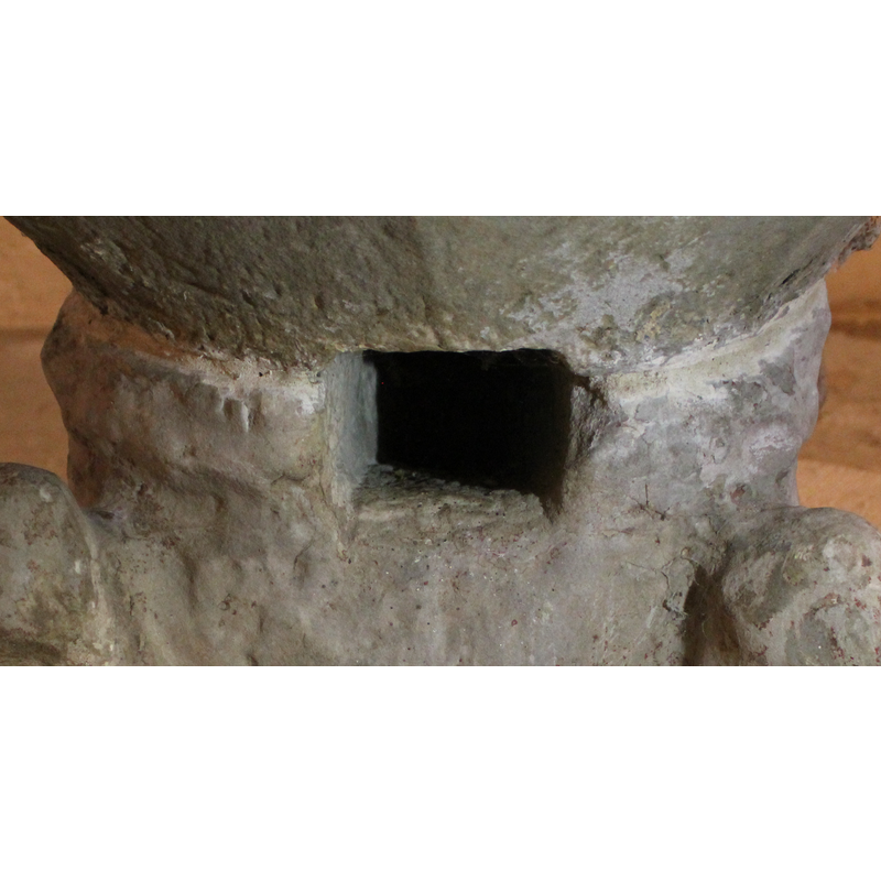 it may have been decorated originally -- the large quadrangular hole is the drain