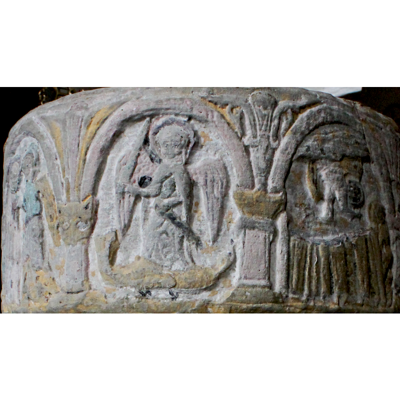 Anunciation at the extreme left; St. Michael and the dragon in the middle; Dream of the Magi at the extreme right
