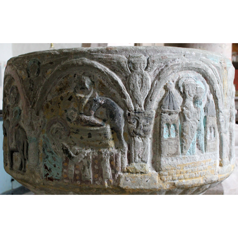 the Nativity in the left arch; the Visitation in the right arch, framed by the two towers