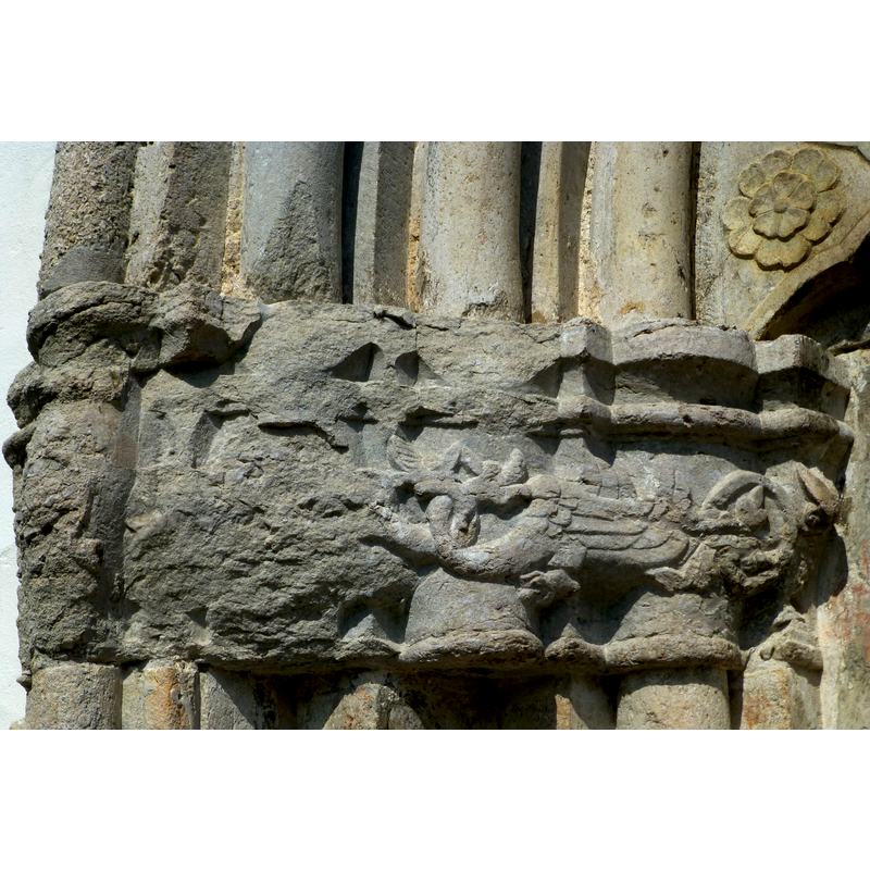much damaged; only a dragon is now visible