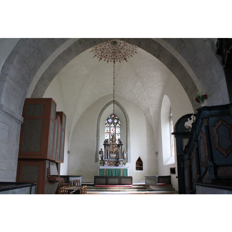with the organ on the left; the pulpit on the right is in the nave