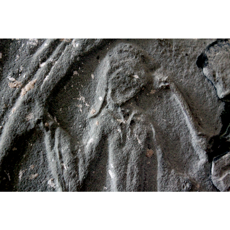 the female figure to the left of Spinario
