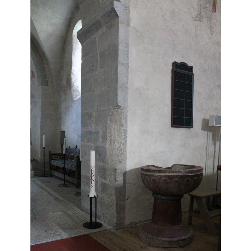 at the east end of the nave, south side, by the chancel arch
