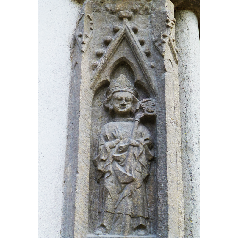 in the upper trefoiled and crocketed niche: a bishop [bishop Grimkell?]