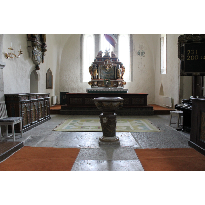 the 17th-century font in the context of the chancel
