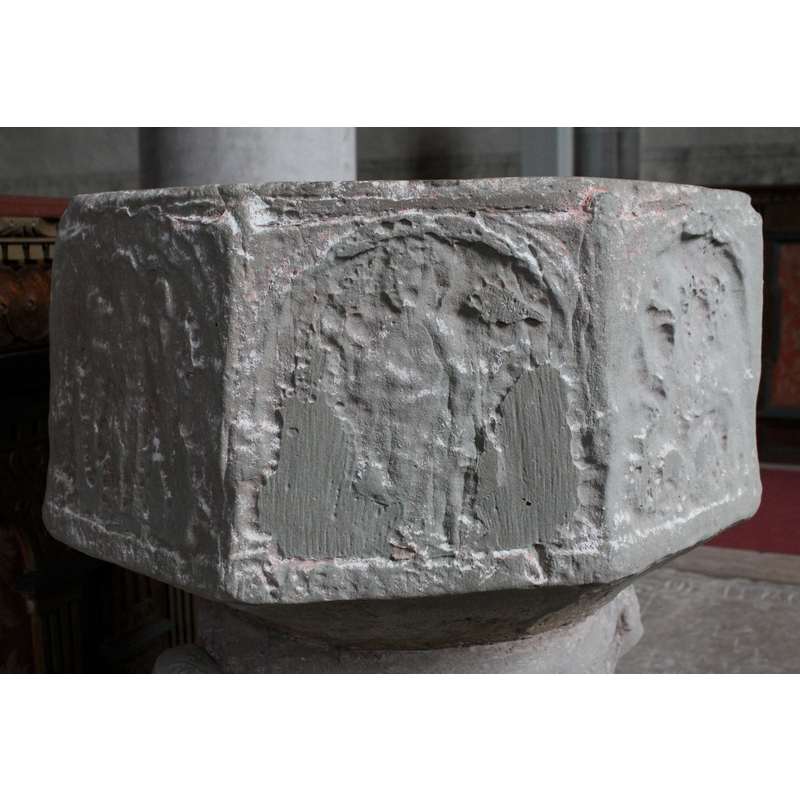 on the southeast side of the basin -- [orientation is approximate] -- seen here on the centre panel; very worn, a long-robed figure, probably haloed, right hand raised?