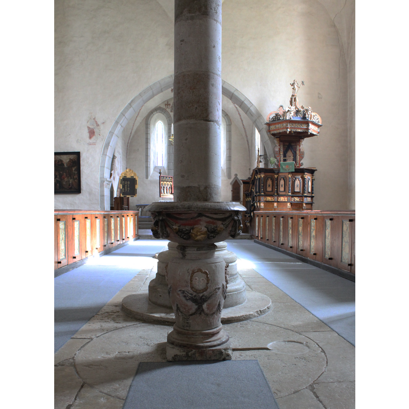 the 17th-century font in the foreground