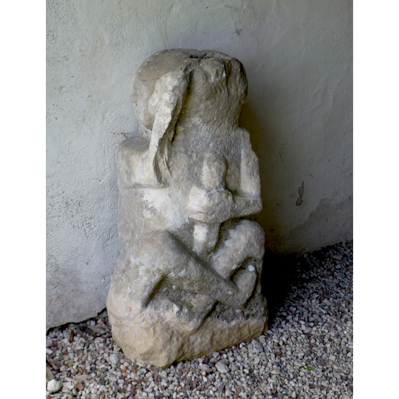 a falic stone kept now in the church, by west entranceway -- it is said localy to have been a gargoyle from the original 12th-century church here