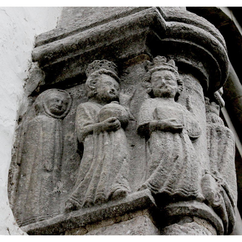 the lone hooded monk and two of the Magi carrying gifts; part of the Adoration of the Magi scene that follows around this side